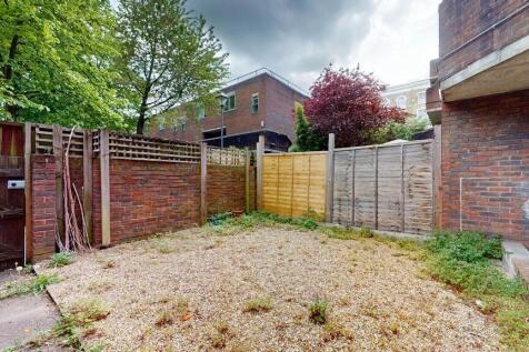 Private low-maintenance rear garden with gravel...