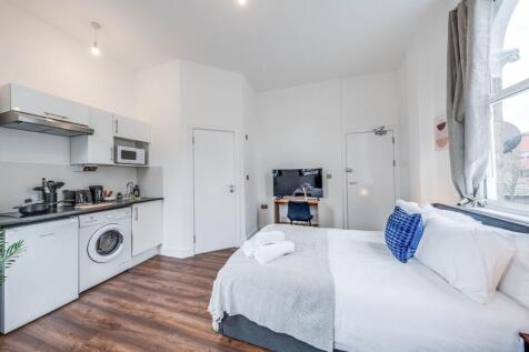 Bright and modern double bedroom featuring a co...