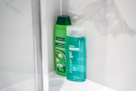 Close-up of a clean, modern bathroom corner fea...