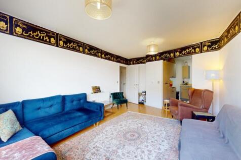 A cozy and inviting living room featuring two c...
