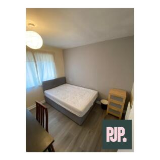 A bright and clean double bedroom with ample sp...