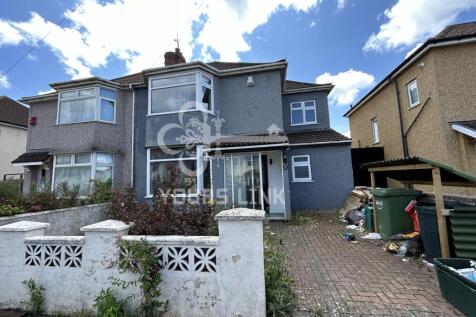 A charming front view of a property with ample ...