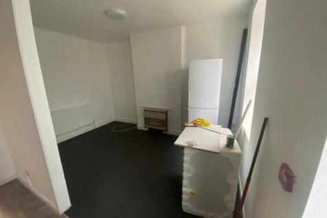 A spacious living room with good potential for ...
