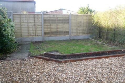 A spacious garden area with potential for outdo...