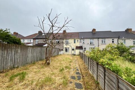 A spacious garden area with potential for outdo...