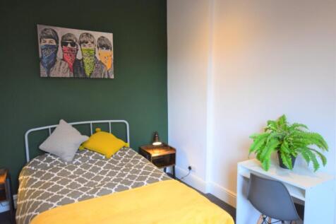 A stylish and inviting double bedroom featuring...