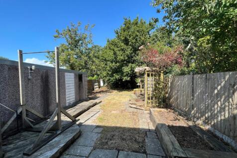 A spacious and well-lit garden area, perfect fo...