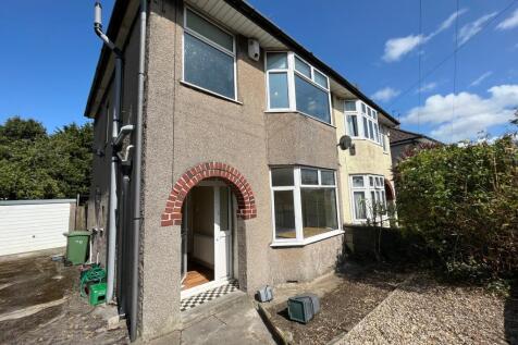 A bright and inviting exterior view of a well-m...