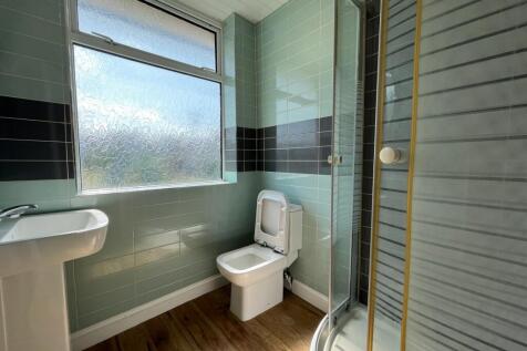 A modern and well-maintained bathroom featuring...