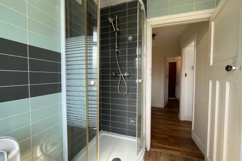 A modern and clean bathroom featuring a stylish...