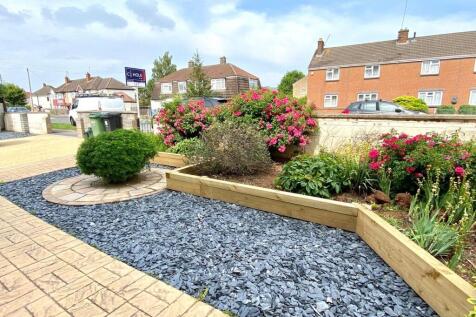 A beautifully landscaped garden with vibrant fl...