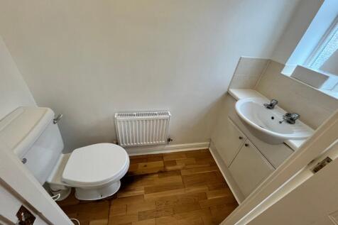 A clean and modern bathroom featuring essential...
