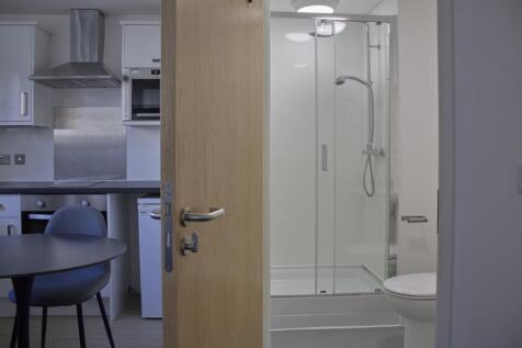 A modern and clean bathroom featuring a stylish...