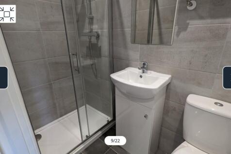 A modern and clean bathroom featuring a stylish...
