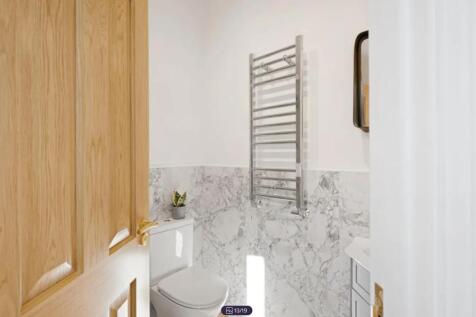 A modern and clean bathroom featuring stylish m...