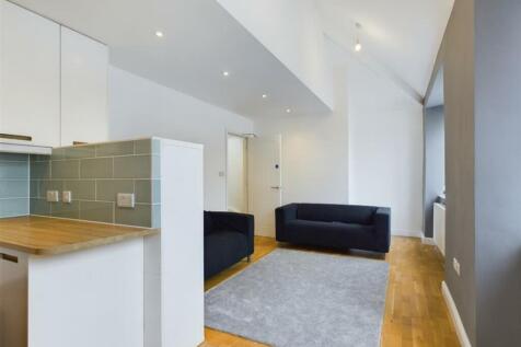 A spacious and stylish modern living room with ...