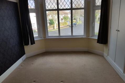 A spacious and bright large double bedroom with...