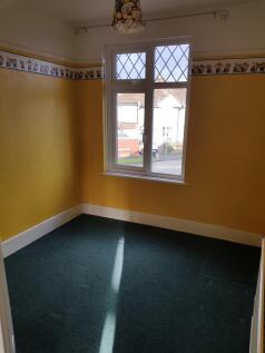 A bright and welcoming double bedroom with chee...