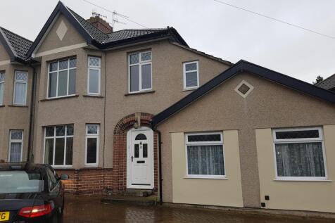 A welcoming exterior of a property featuring a ...