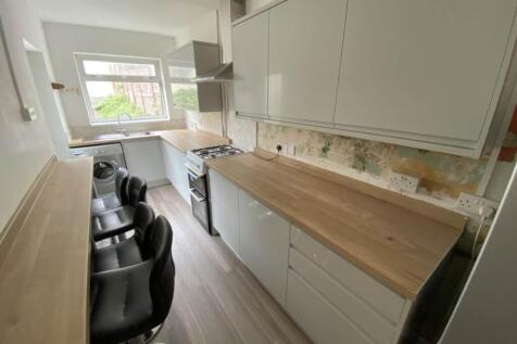 A modern kitchen with ample counter space and n...