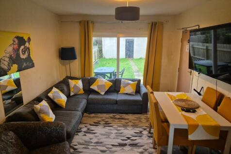 A spacious and inviting modern living room with...