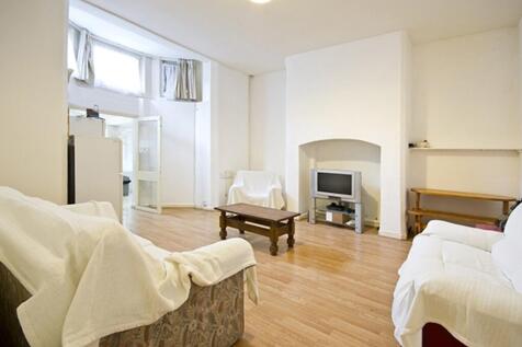 A spacious and inviting living room, perfect fo...