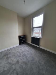 Bright and inviting double bedroom featuring a ...