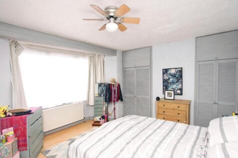 A spacious and bright large double bedroom with...
