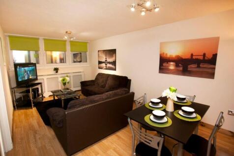 A spacious and inviting large modern living roo...