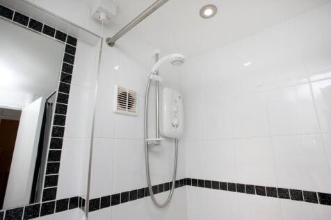 A modern and clean bathroom featuring a stylish...