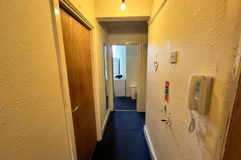 A tidy hallway with a welcoming atmosphere, ide...