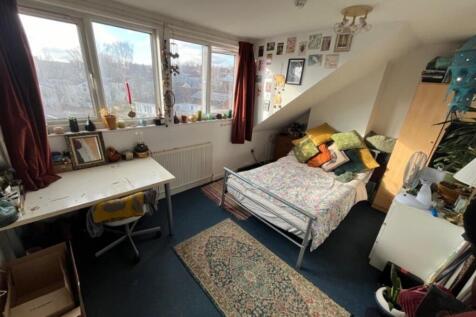 A bright and cozy double bedroom with ample nat...