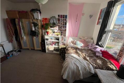 A cozy double bedroom filled with natural light...