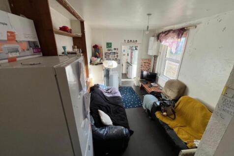 A cozy living room with a welcoming atmosphere,...
