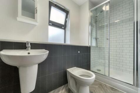 A modern and clean bathroom featuring a stylish...