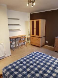 A spacious and inviting double bedroom, perfect...