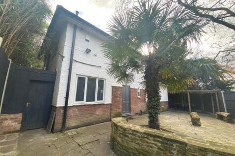 A welcoming exterior view of a property featuri...