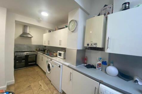 A bright and functional kitchen equipped with m...