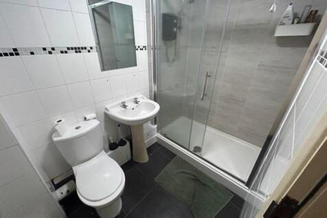 A modern bathroom featuring a clean and functio...