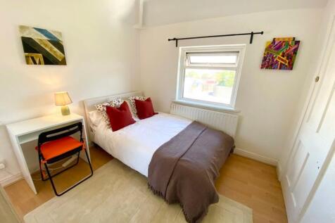 A bright and inviting double bedroom, perfect f...