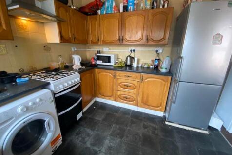 A functional kitchenette featuring essential ap...