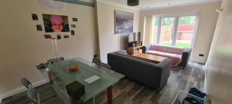 A spacious and inviting large modern living roo...