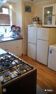 A functional and well-equipped kitchenette, per...