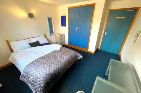A bright and inviting double bedroom, perfect f...