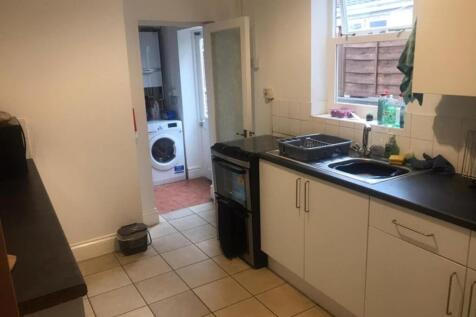 A functional and tidy kitchen with good lightin...