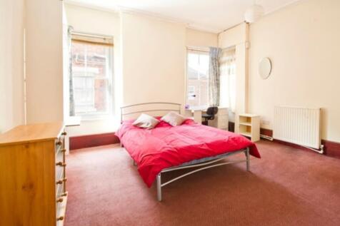 A spacious and inviting double bedroom, perfect...