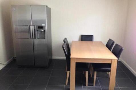 Bright and spacious kitchen area featuring mode...