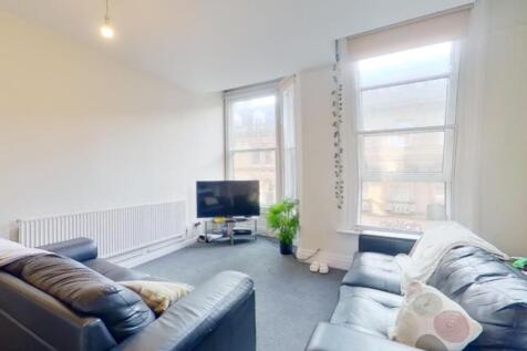 A spacious and bright modern living room with l...
