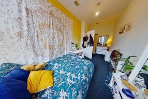 A vibrant and inviting double bedroom featuring...