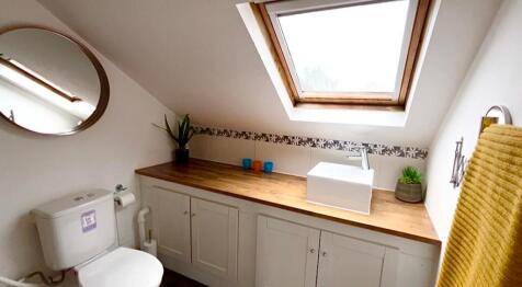 A beautifully designed bathroom featuring a sty...